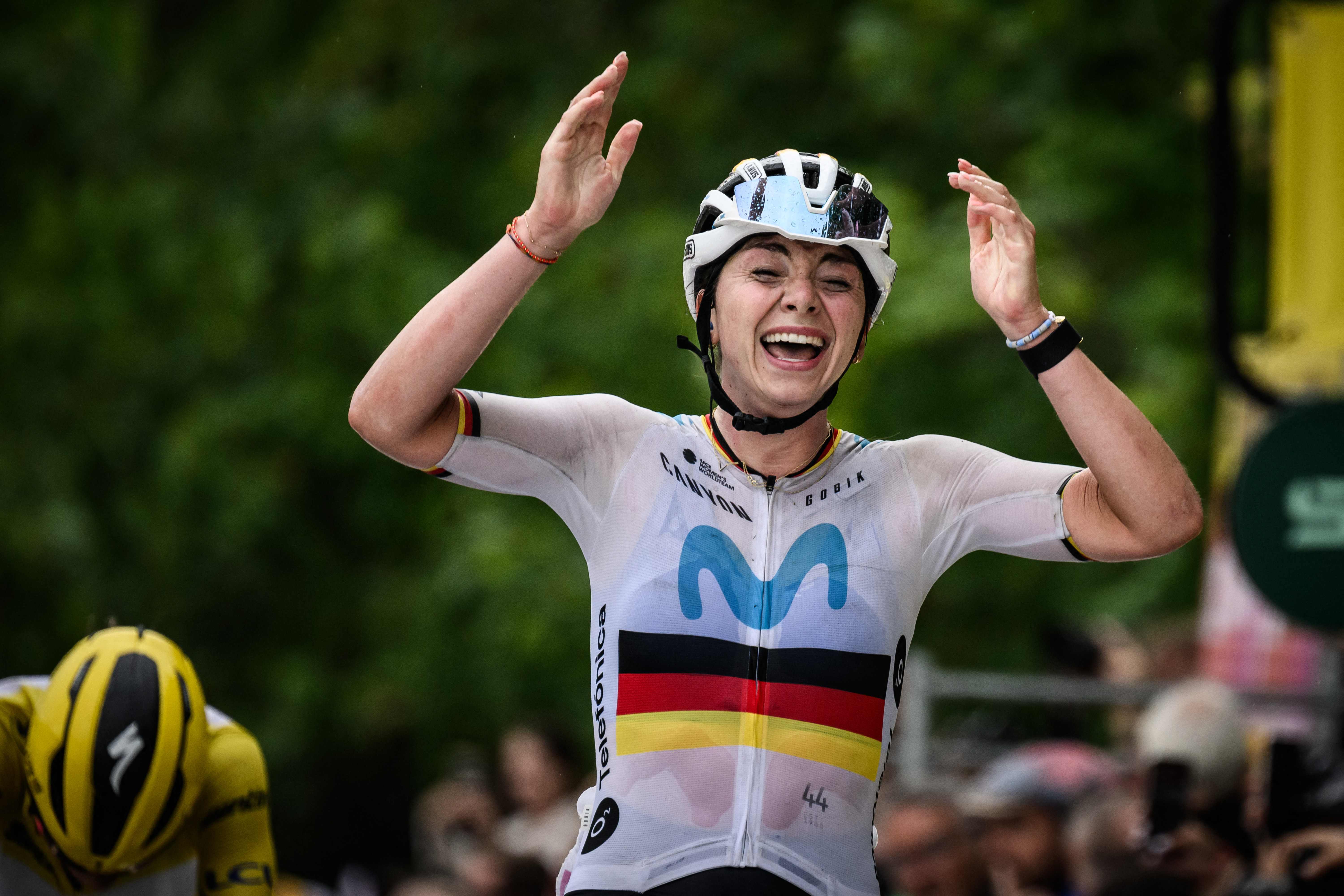 Pembalap tim Movistar asal Jerman Liane Lippert melakukan selebrasi usai finis terdepan di etape kedua Tour de France.