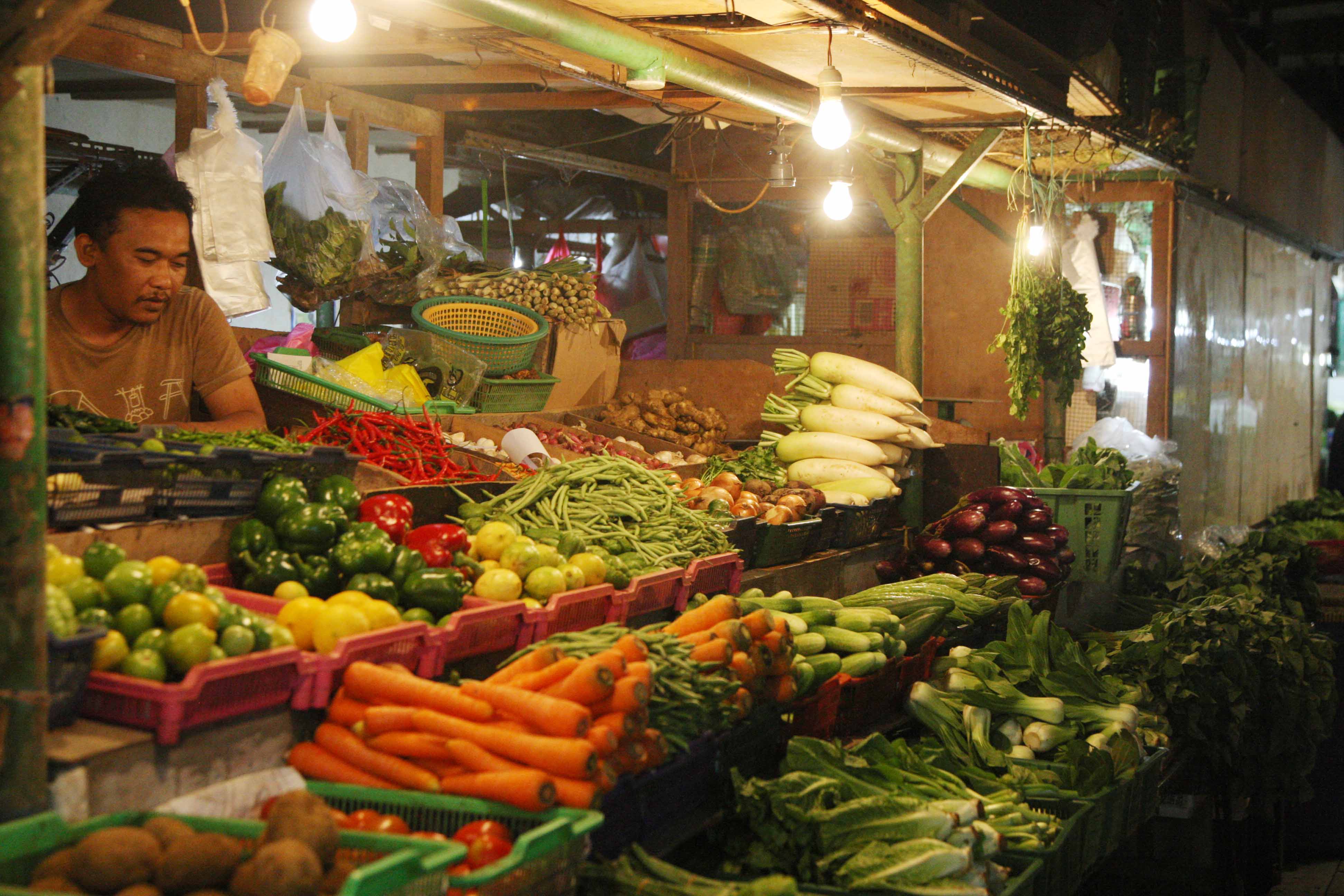 Ilustrasi pedagang di pasar.