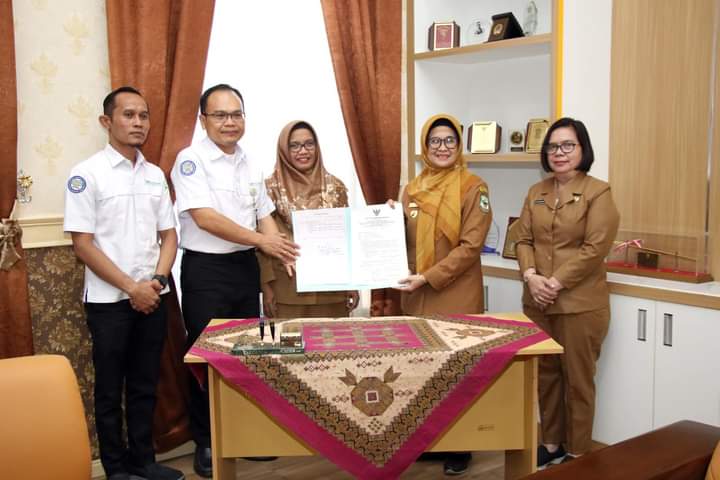 Penandatangan pakta integritas dengan BPJS Kesehatan Pematang Siantar di ruang kerja Wali Kota Pematang Siantar, Senin (7/8).