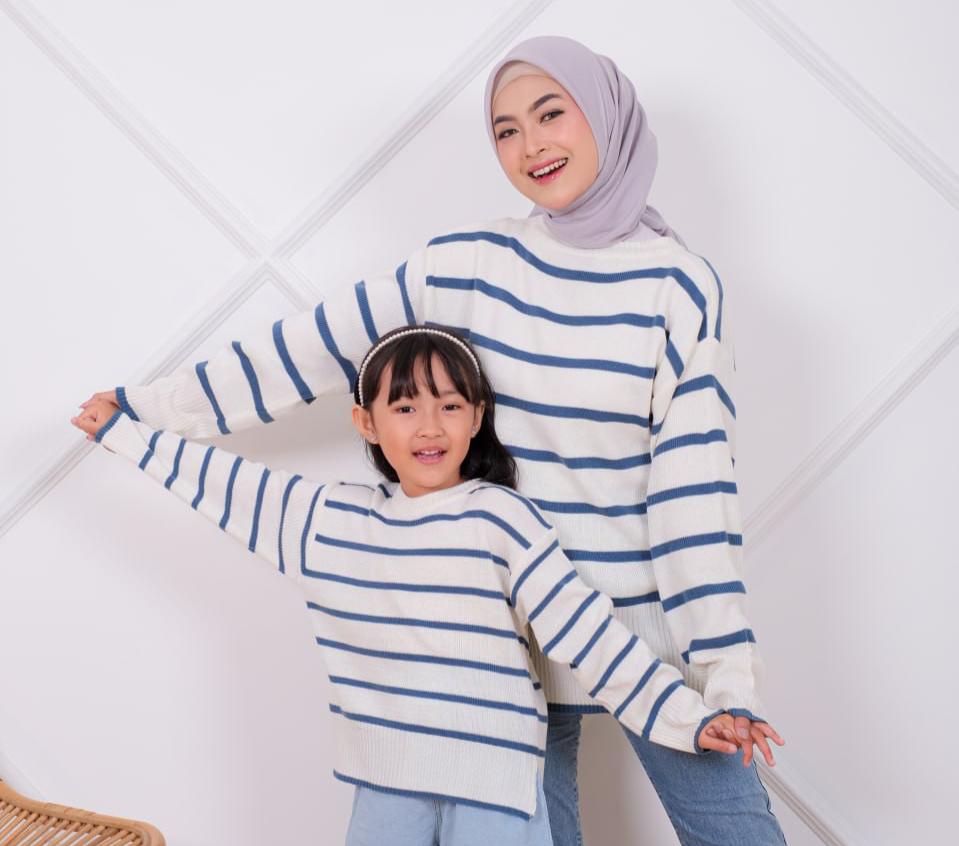 Berpakaian serasi dan kompak antara bunda dan buah hatinya dapat menjadi salah satu elemen 'bonding time'.
