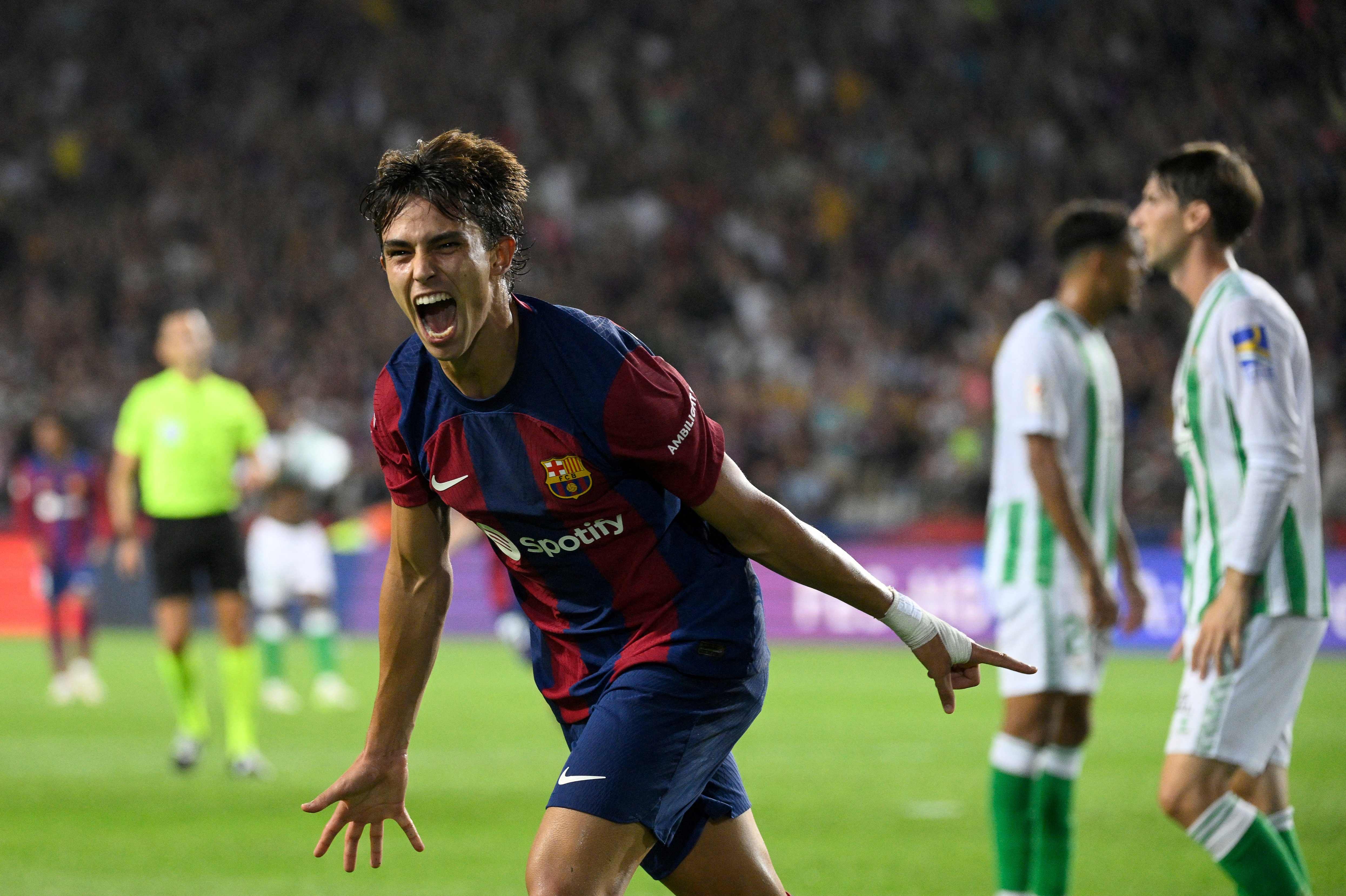 Penyerang Barcelona Joao Felix melakukan selebrasi usai mencetak gol ke gawang Real Betis di laga La Liga