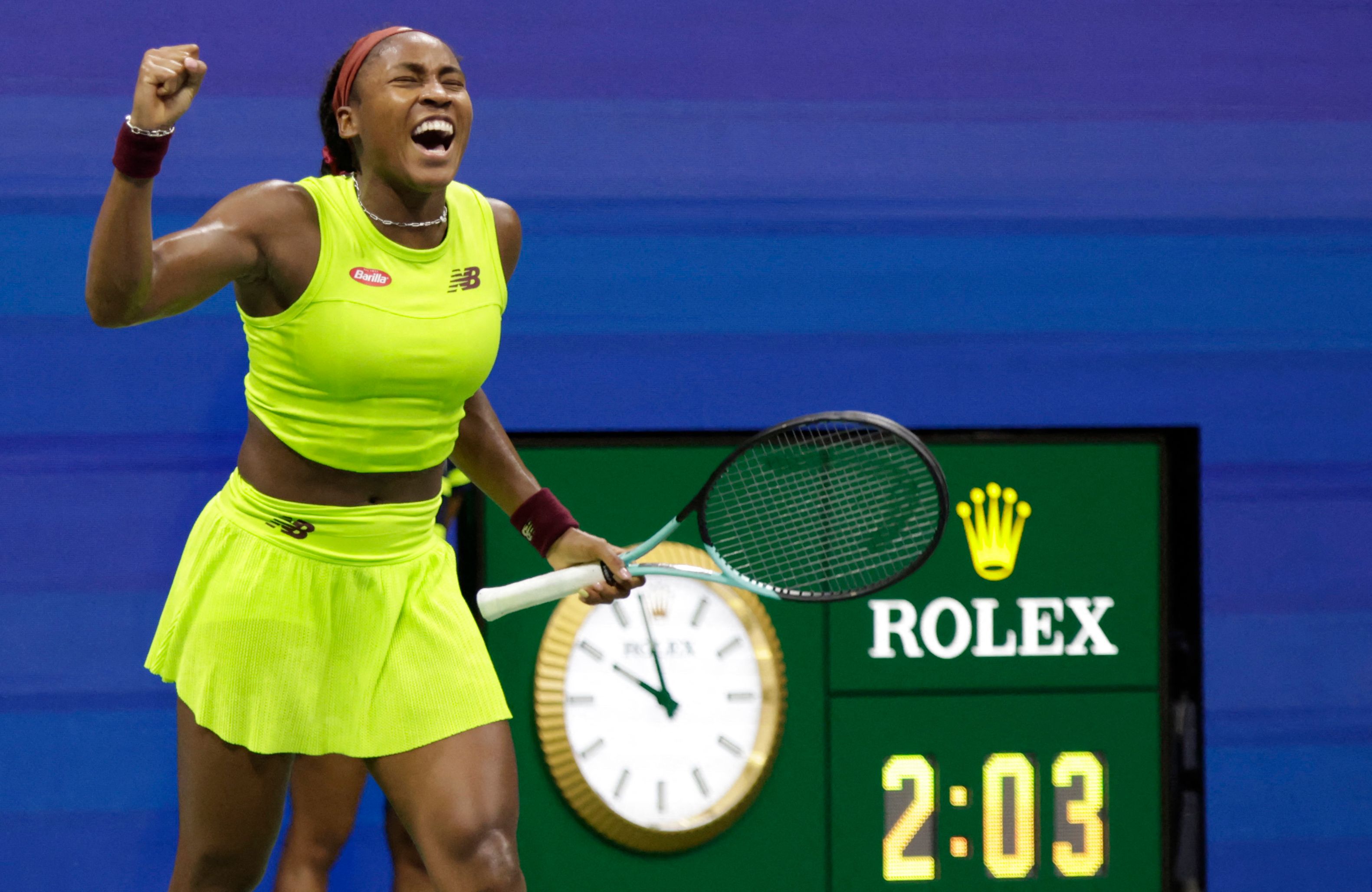 Coco Gauff merayakan kemenangannya atas Karolina Muchova, Kamis (7/9).