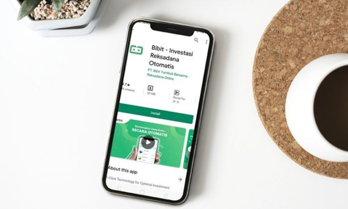 Layar smartphone menunjukkan aplikasi untuk investasi reksadana. 