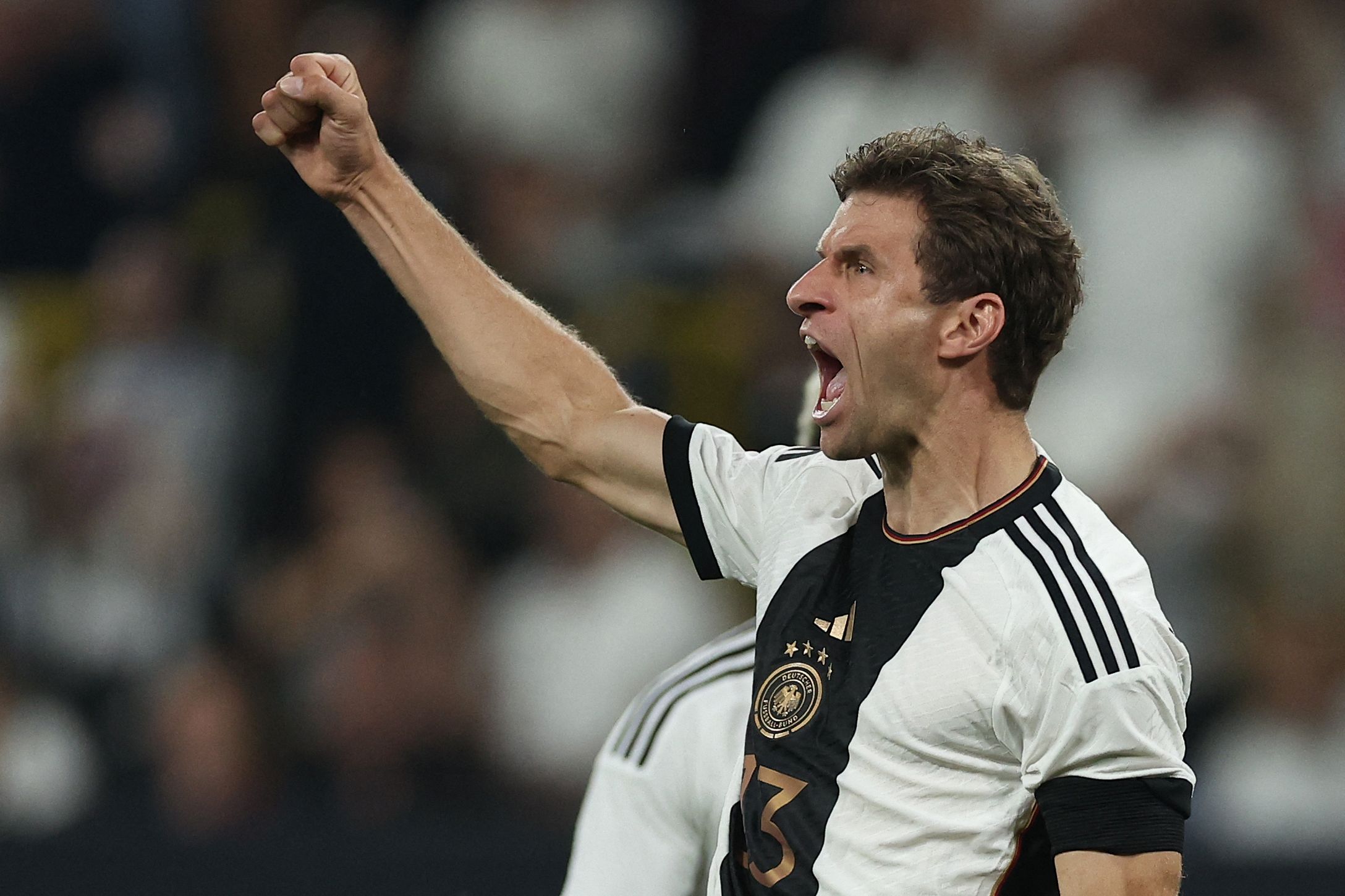 Penyerang timnas Jerman Thomas Mueller melakukan selebrasi usai mencetak gol ke gawang Prancis di laga persahabatan.