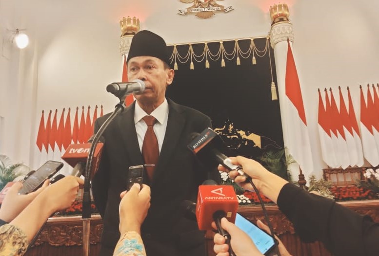 Ketua KPK yang baru Nawawi Pomolango usai dilantik Presiden Jokowi di Istana Negara.