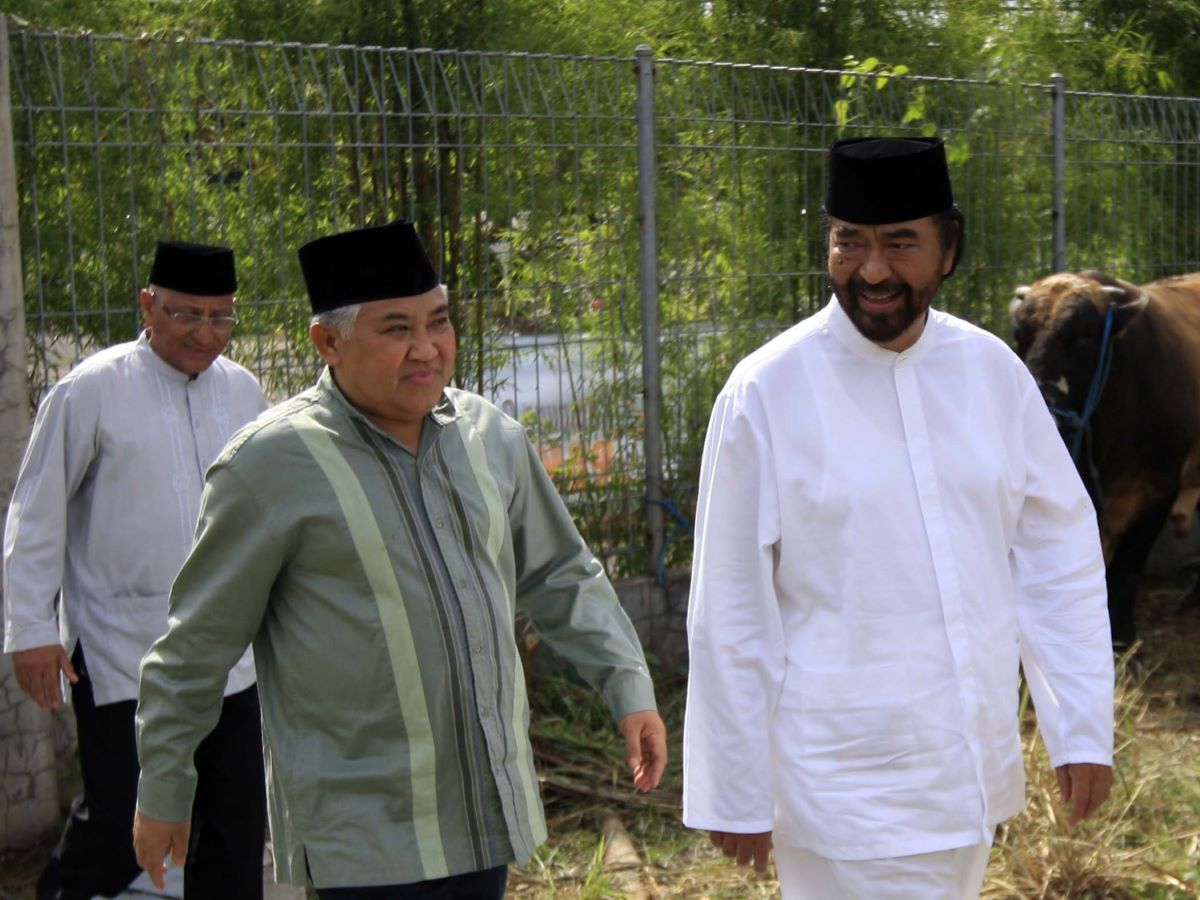 Din Syamsudin berjalan bersama Ketua Umum NasDem Surya Paloh.