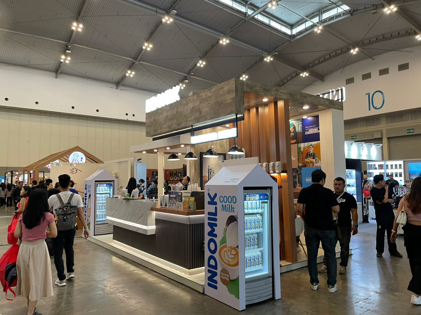 Produk susu dari PT Indolakto, Indomilik, turut berpartisipai pada ajang Jakarta Coffee Week 2023 di Hall 10 ICE BSD, Tangerang, Banten.