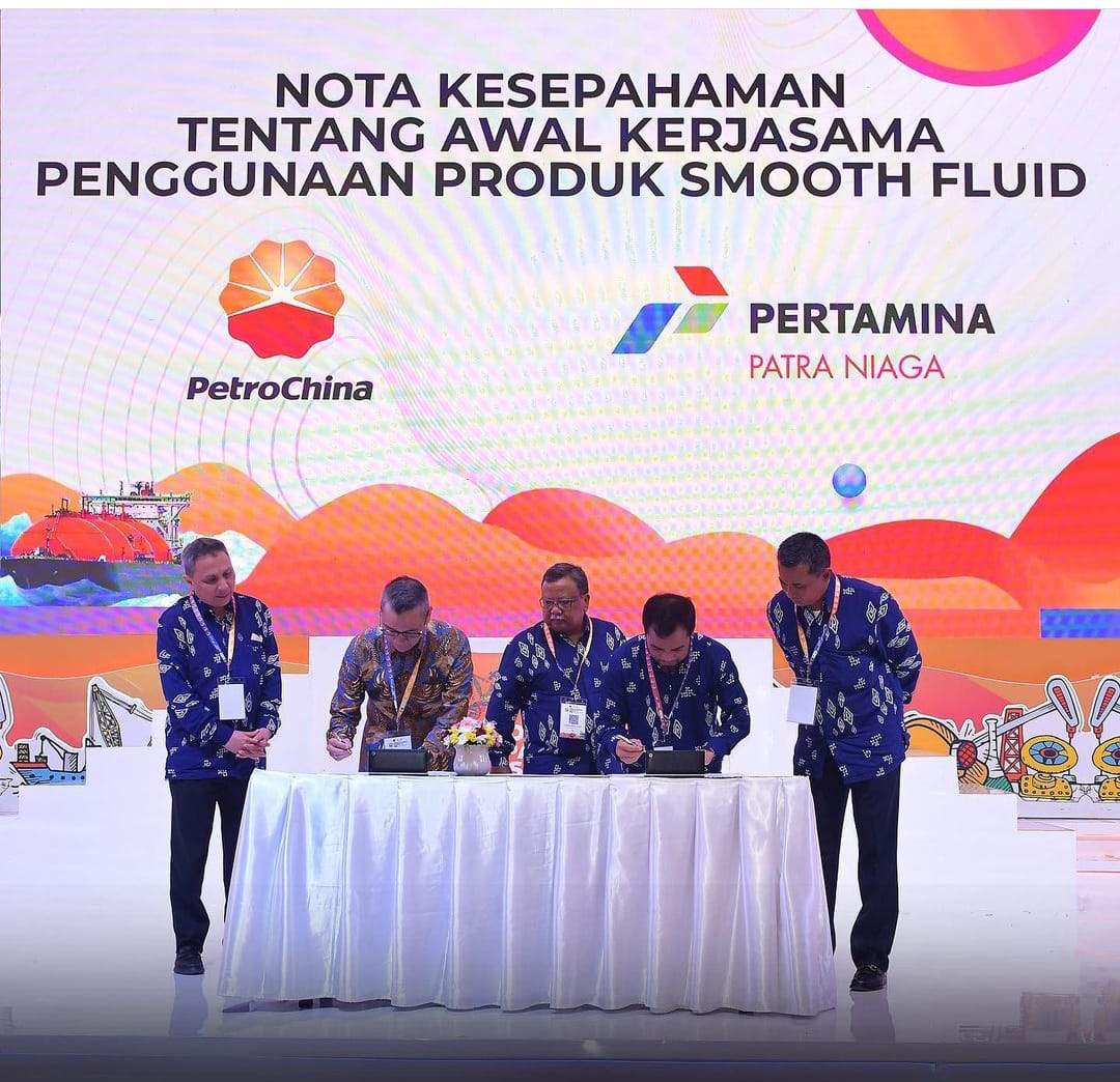 Penandatangan kerja sama antara PPN dan PetroChina Jabung pada Forum Kapasitas Nasional III di Jakarta.