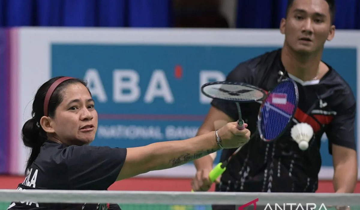 Atlet Para-bulu tangkis Leani Ratri Oktila dan Hikmat Ramdani.