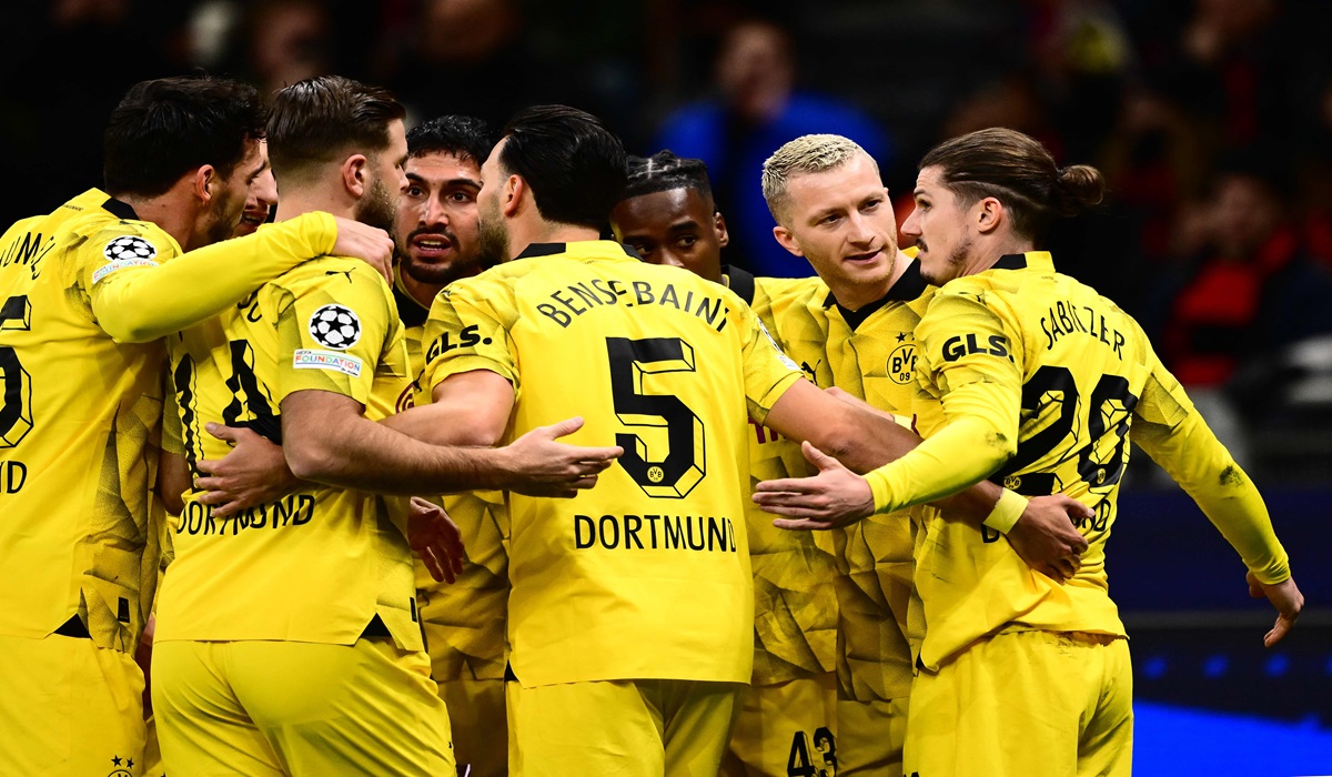 Para pemain Borussia Dortmund melakukan selebrasi usai mencetak gol ke gawang AC Milan di laga Liga Champions.