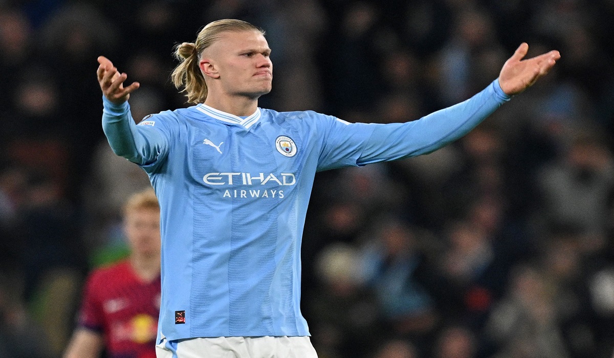 Penyerang Manchester City Erling Haaland melakukan selebrasi usai mencetak gol ke gawang RB Leipzig di laga Liga Champions.