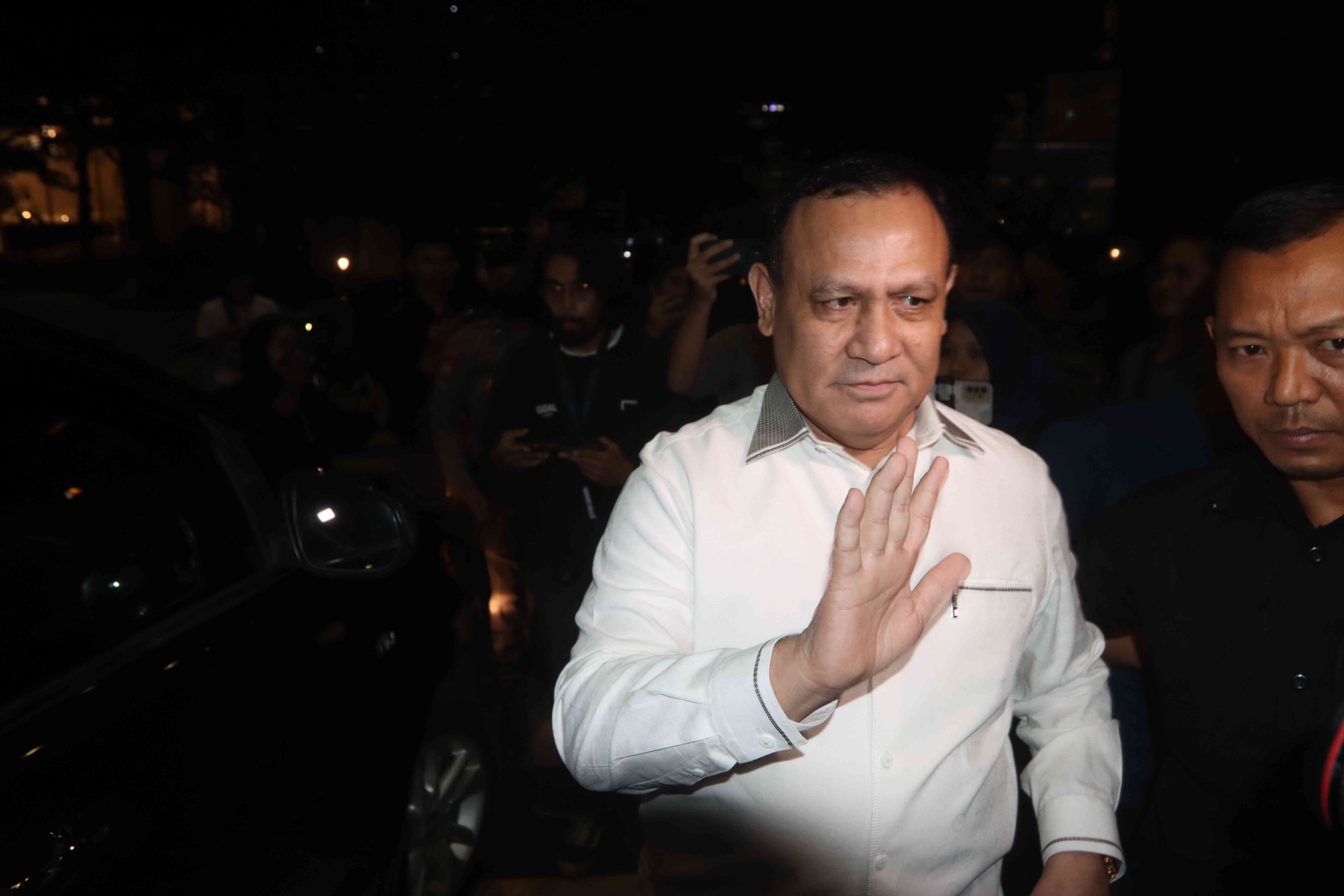 Ketua KPK nonaktif Firli Bahuri keluar dari Gedung KPK, Jakarta, Kamis (21/12/2023).