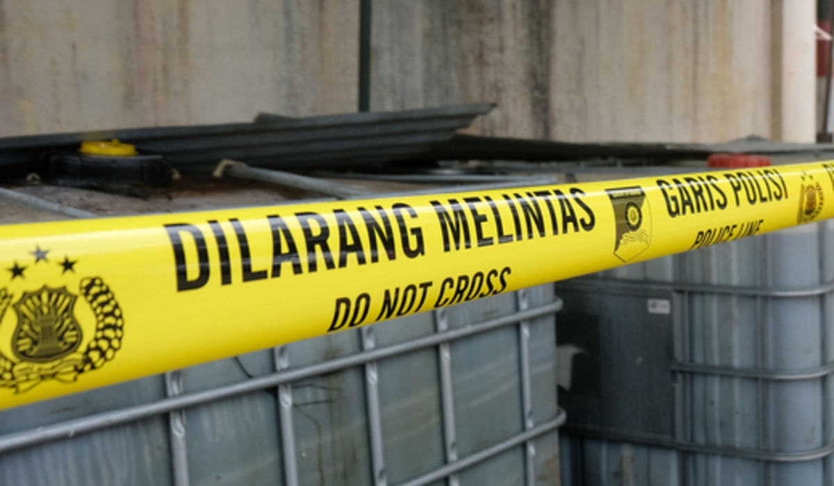 Ilustrasi garis polisi di lokasi TKP aborsi.