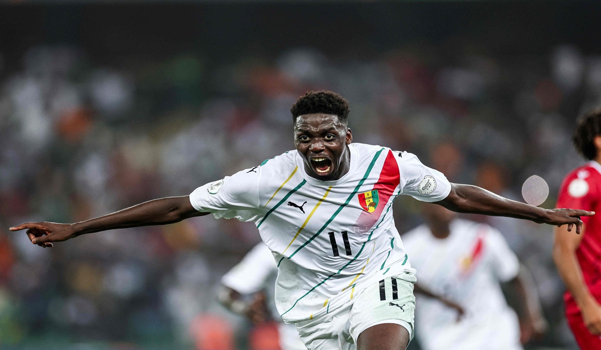 Gelandang Guinea Mohamed Bayo melakukan selebrasi usai mencetak gol ke gawang Guinea Ekuatorial di laga Piala Afrika.
