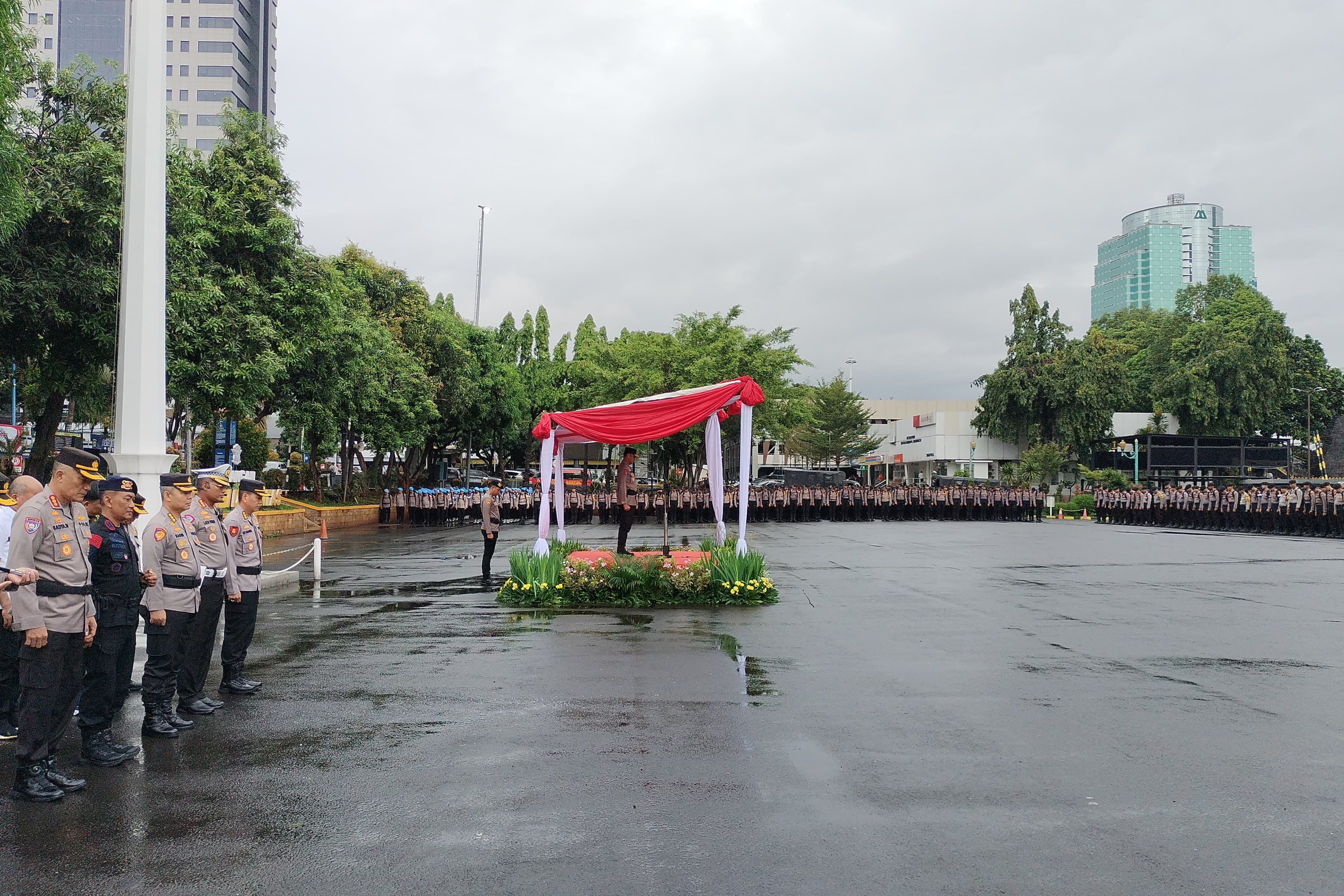 Apel pengamanan tempat pemungutan suara (TPS) di Lapangan Presisi Ditlantas Polda Metro Jaya.