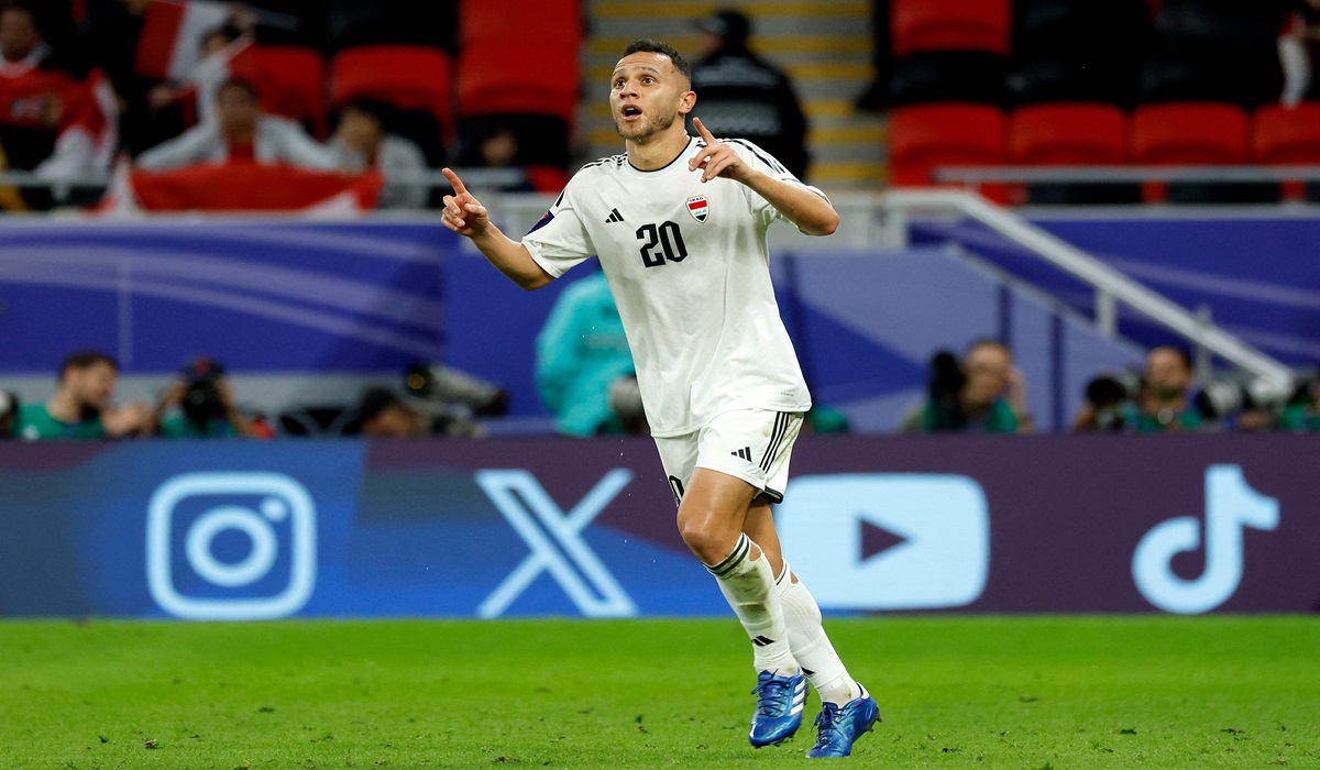 Gelandang Irak Osama Rashid melakukan selebrasi usai mencetak gol ke gawang Indonesia di laga Piala Asia.