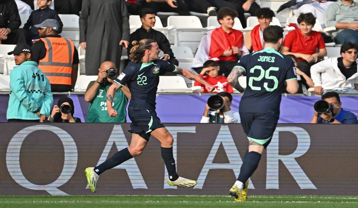 Gelandang Australia Jackson Irvine (kiri) melakukan selebrasi usai mencetak gol ke gawang Suriah di laga Piala Asia.