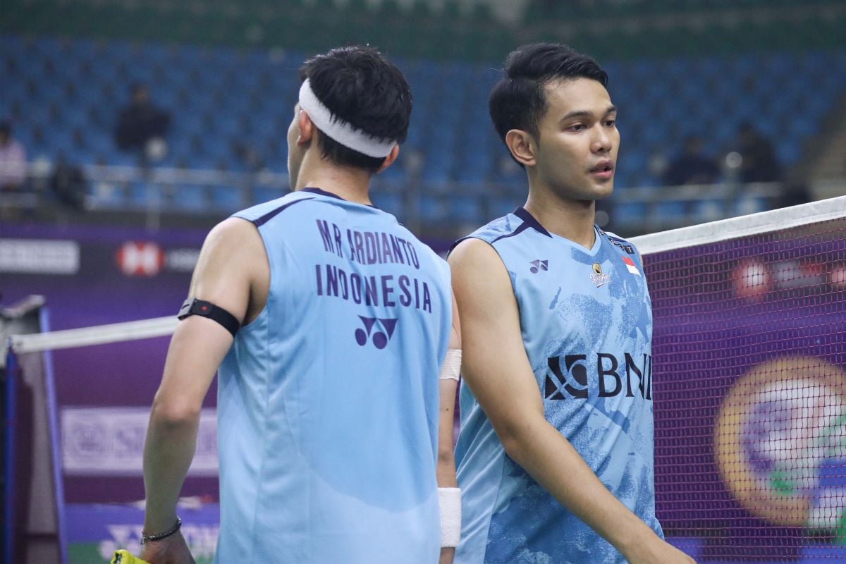 Ganda putra Fajar Alfian dan Muhammad Rian Ardianto seusai ditaklukkan Korea di India Open, Jumat (19/1).