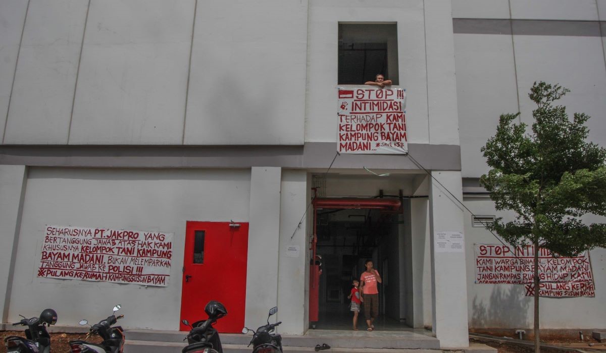 Warga beraktivitas di Kampung Susun Bayam (KSB), Papanggo, Tanjung Priok, Jakarta Utara, Jumat (26/01/2024)