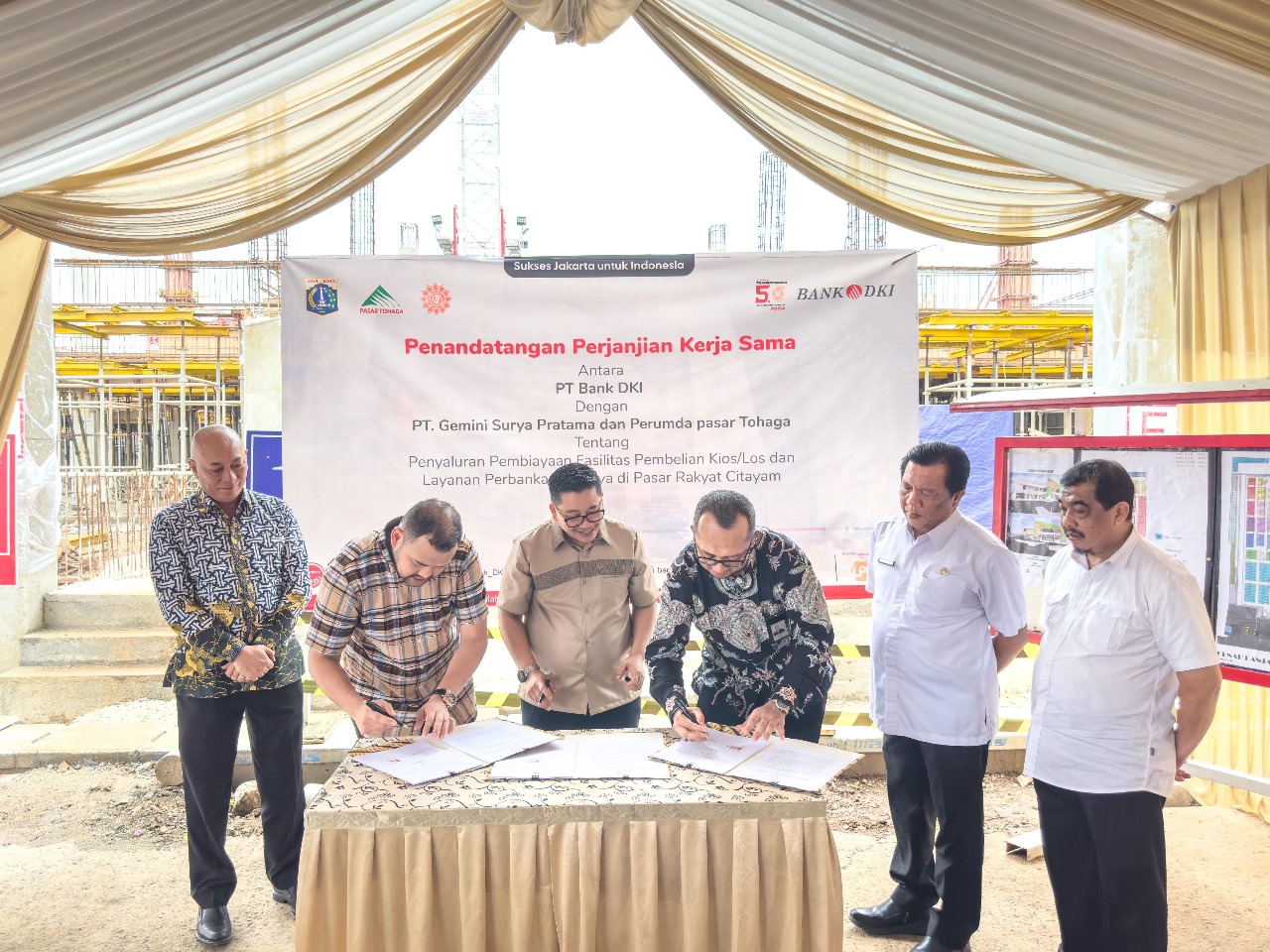 Kerja sama antara Bank DKI Syariah dengan Perumda Pasar Tohaga dan PT Gemini Surya Pratama.