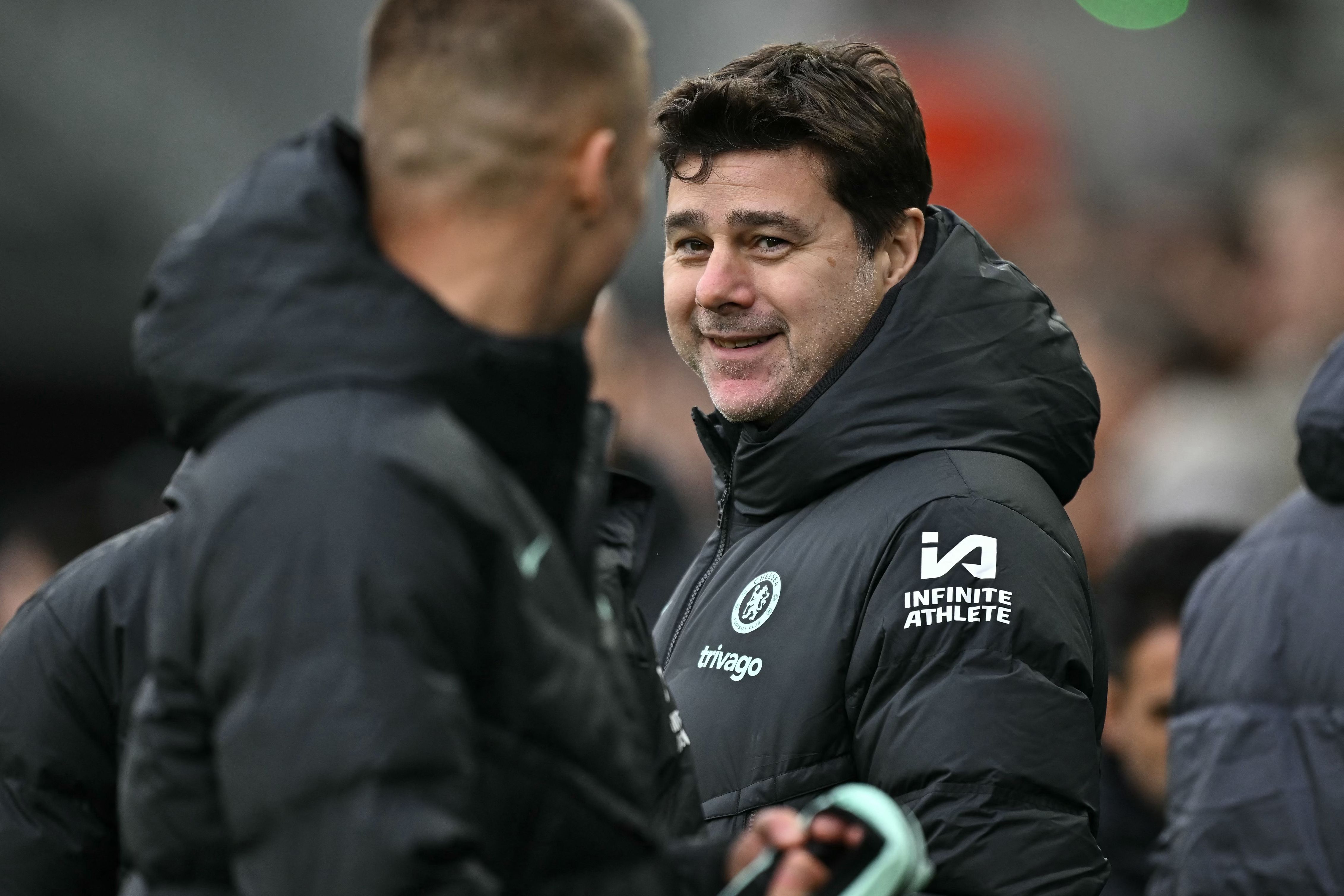 Senyum di wajah Mauricio Pochettino kembali setelah kemenangan Chelsea atas Aston Villa, Rabu (7/2).