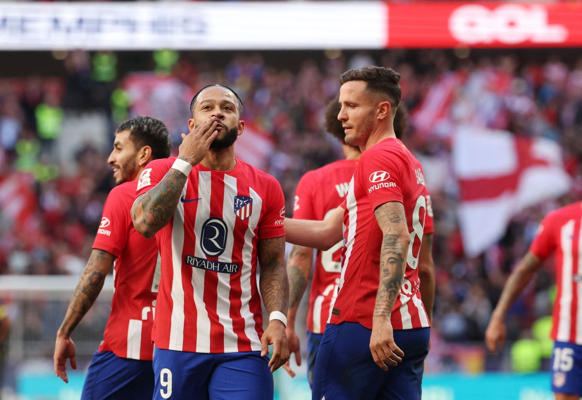 Para pemain Atletico Madrid merayakan kemenangan atas Las Palmas.