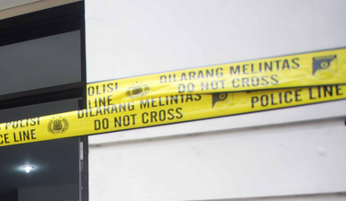 Ilustrasi TKP yang ditandai garis polisi.