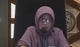 Ustazah Dewi Andriani.