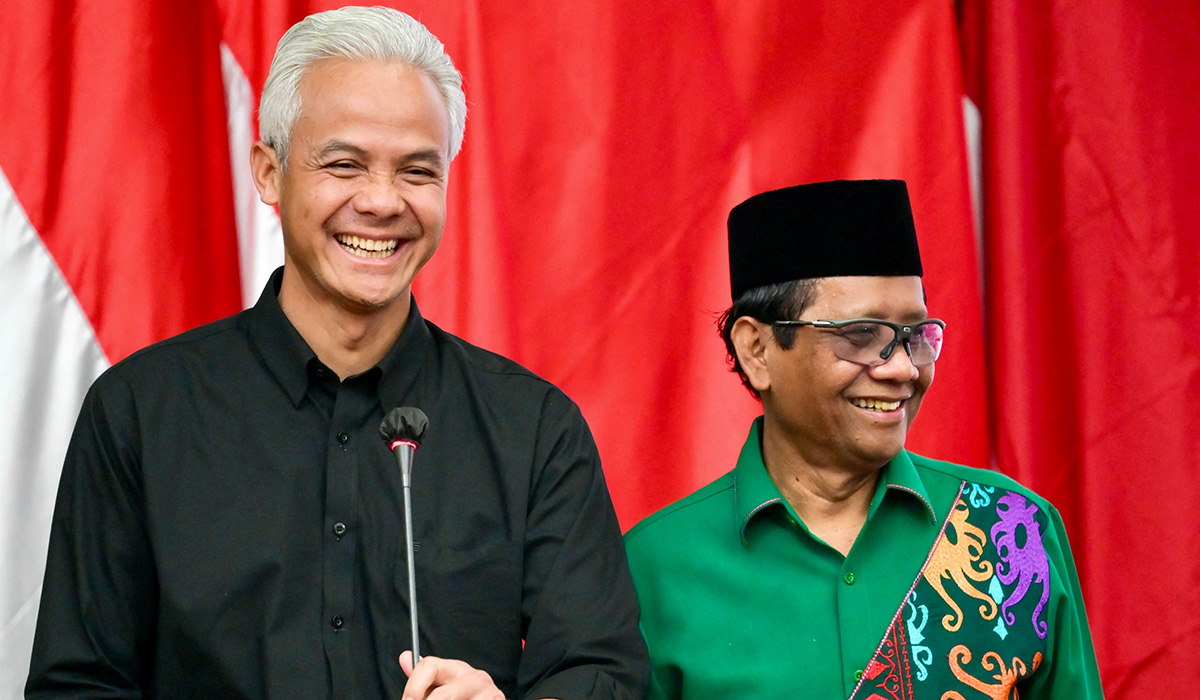Ganjar Pranowo (kiri) dan Mahfud MD.