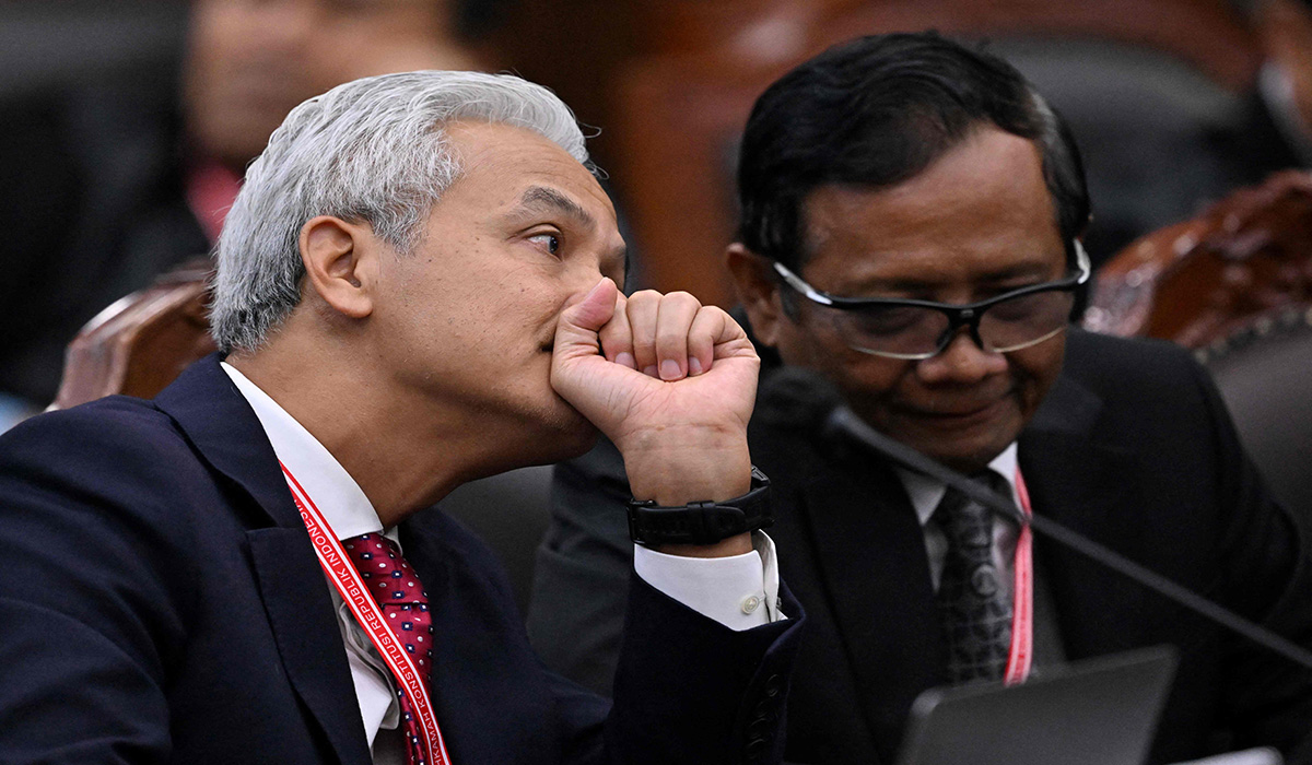 Ganjar Pranowo (kiri) dan Mahfud MD.