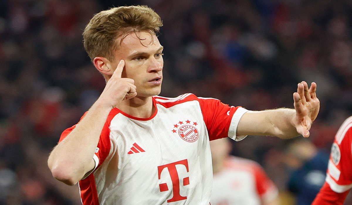 Gelandang Bayern Muenchen Joshua Kimmich melakukan selebrasi usai mencetak gol ke gawang Arsenal di laga Liga Champions.
