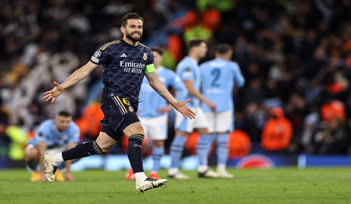 Kapten Real Madrid Nacho Fernandez melakukan selebrasi usai timnya memastikan diri lolos ke semifinal Liga Champions.