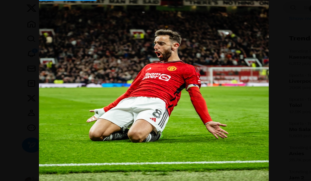 Kapten Manchester United Bruno Fernandes melakukan selebrasi usai menjebol gawang Sheffield United di laga Liga Primer Inggris.