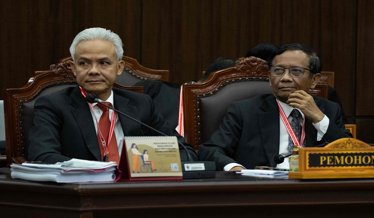 Pasangan capres dan cawapres nomor urut 3 Ganjar Pranowo dan Mahfud MD kala menghadiri sidang PHPU di Mahkamah Konstitusi.