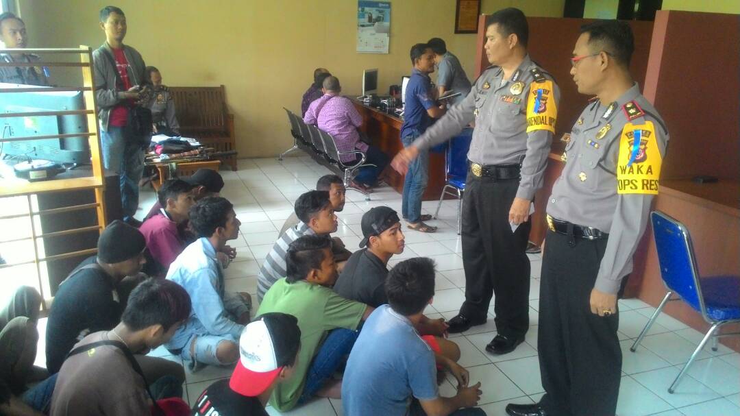 ilustrasi : juru parkir liar ditangkap polisi