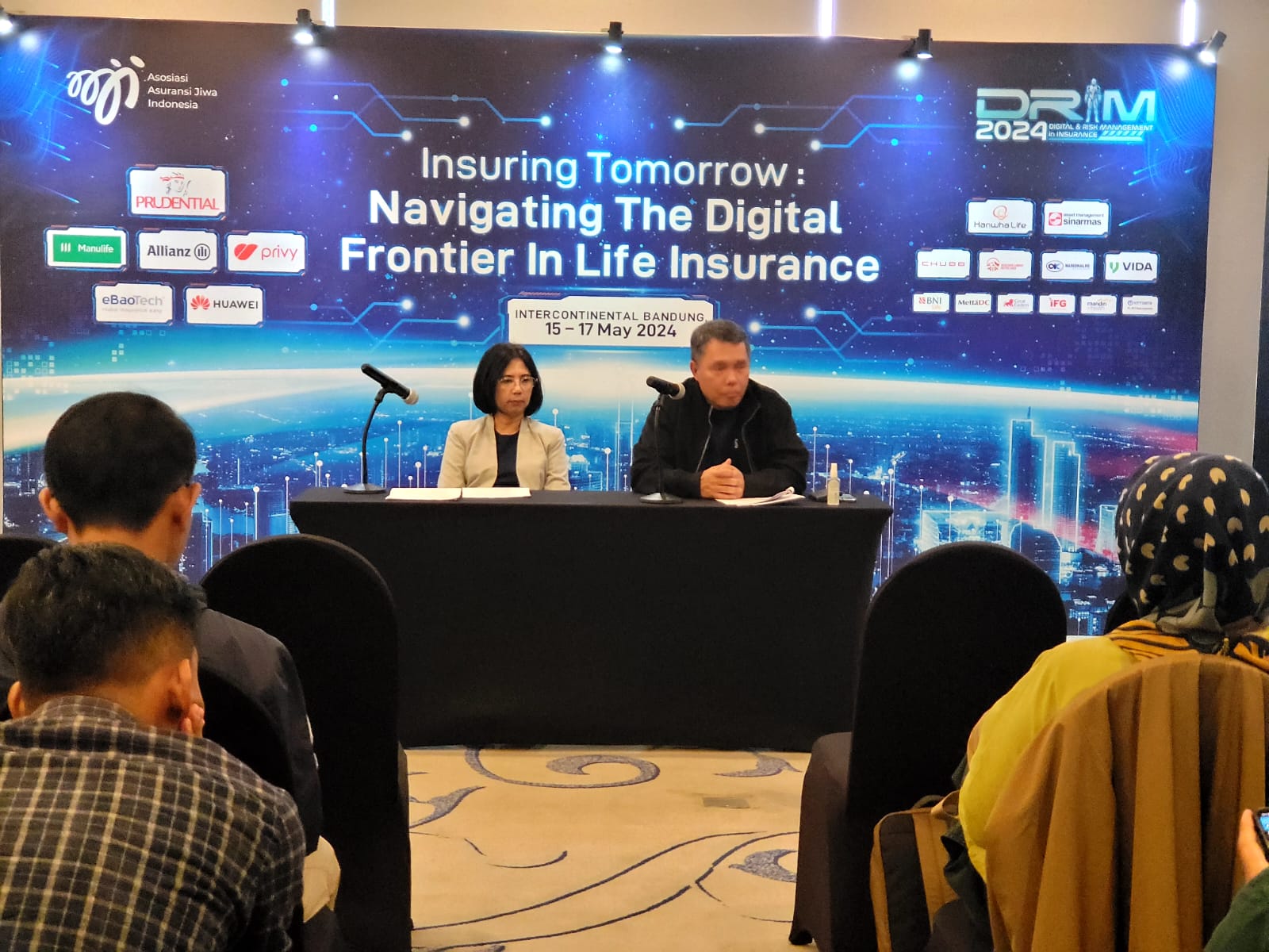  Ketua Dewan Pengurus AAJI, Budi Tampubolon berbicara pada Seminar Internasional Digital & Risk Management in Insurance (DRiM) ke-7.