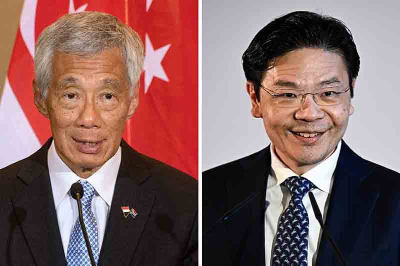 Perdana Menteri Singapura Lee Hsien Loong (kiri) dan Wakil PM Lawrence Wong.