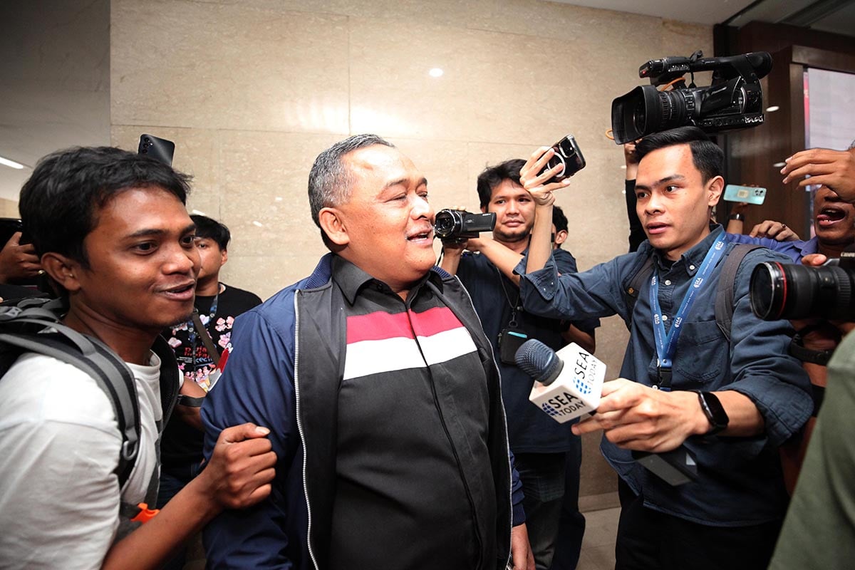 Kepala Badan Perlindungan Pekerja Migran (BP2MI) Benny Ramdhani (tengah).