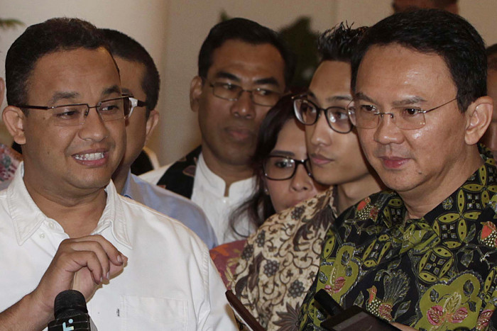 Anies Baswedan (kiri) dan Basuki Tjahaja Purnama (kanan).