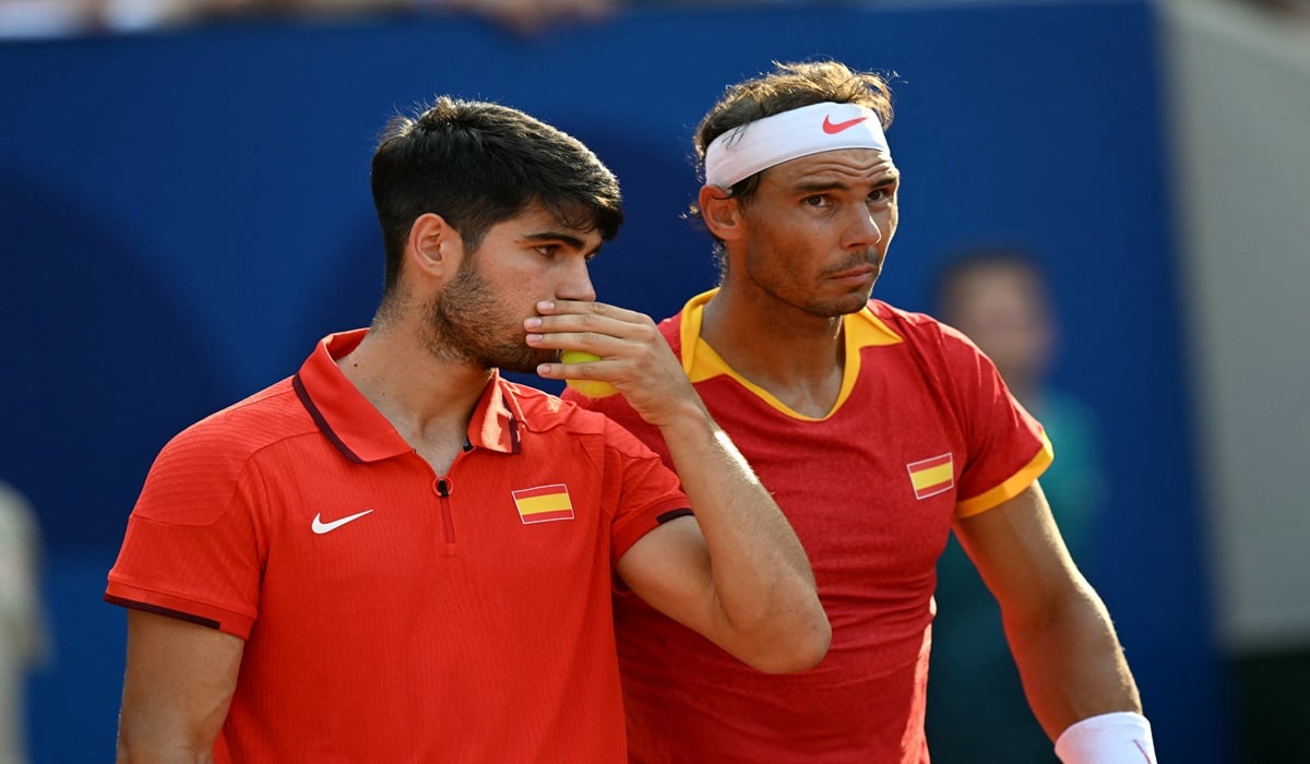 Ganda putra tenis Spanyol Carlos Alcaraz dan Rafael Nadal