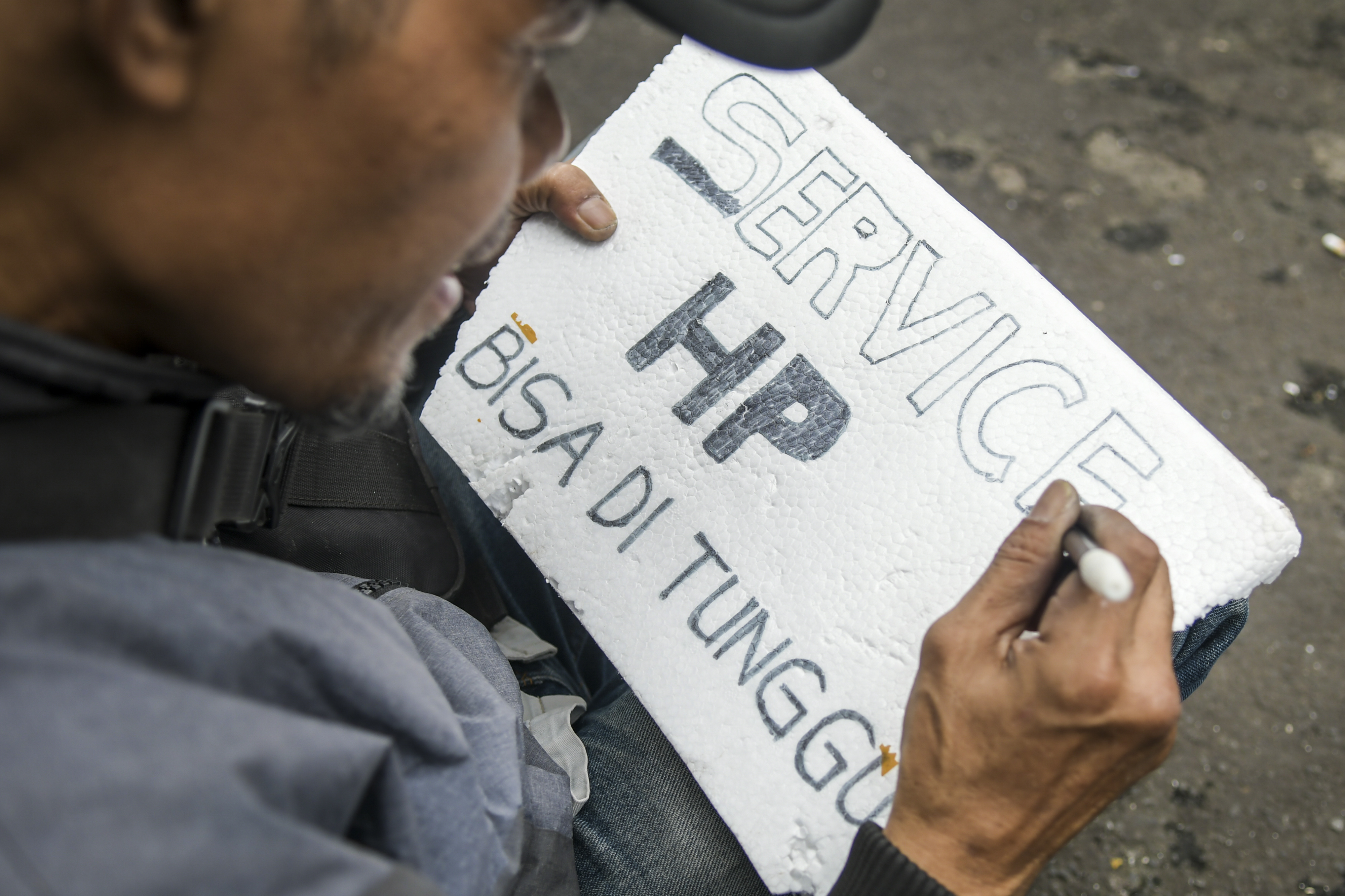 Jasa Servis Telepon Genggam