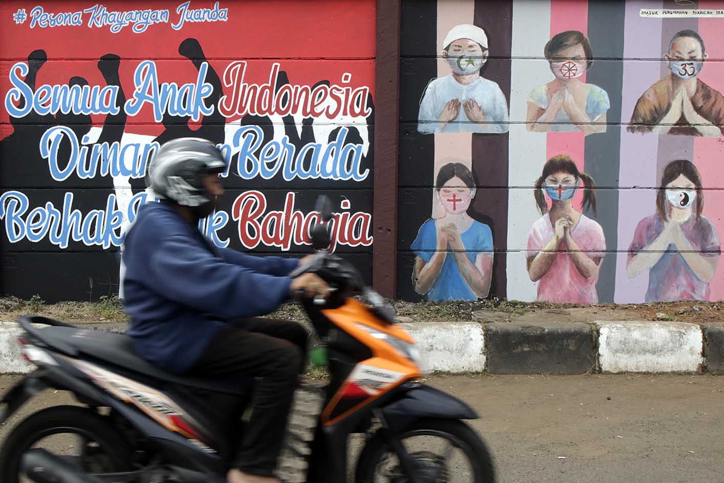 Mural Edukasi Cegah Covid-19 dan Toleransi Antar Umat Beragama