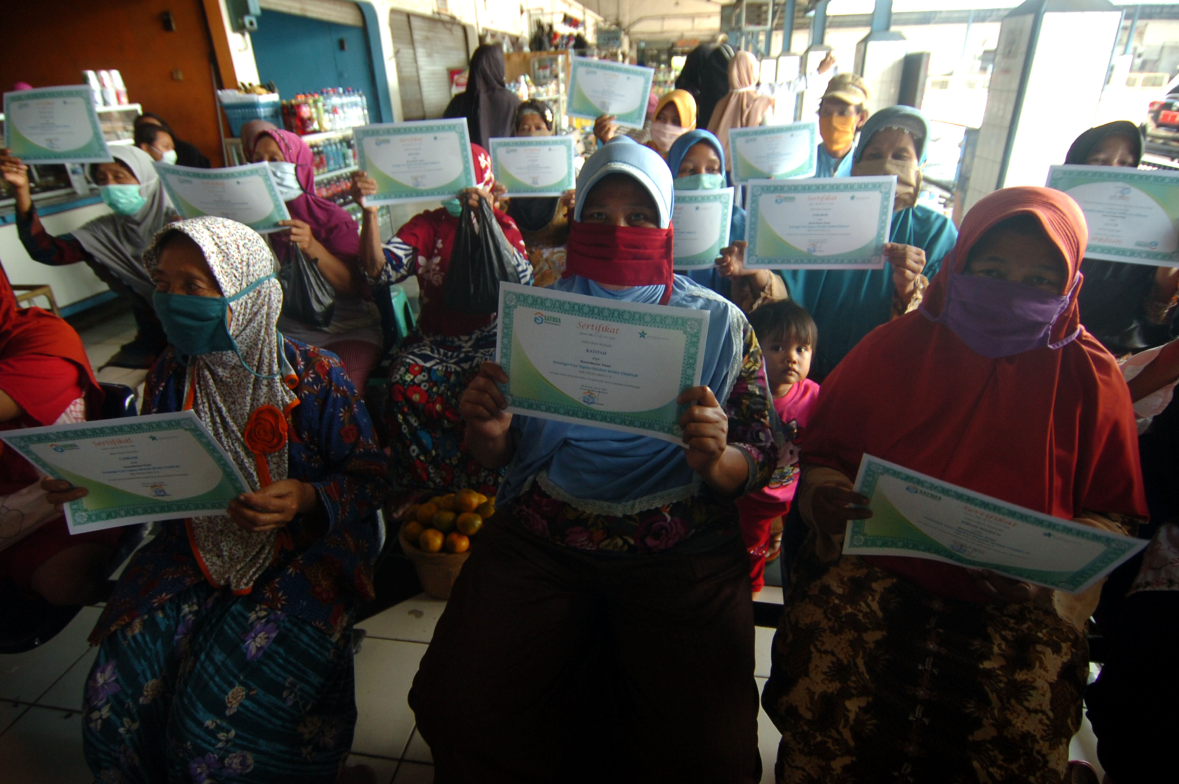 Pedagang Asongan Peringati Hari Aksara Internasional