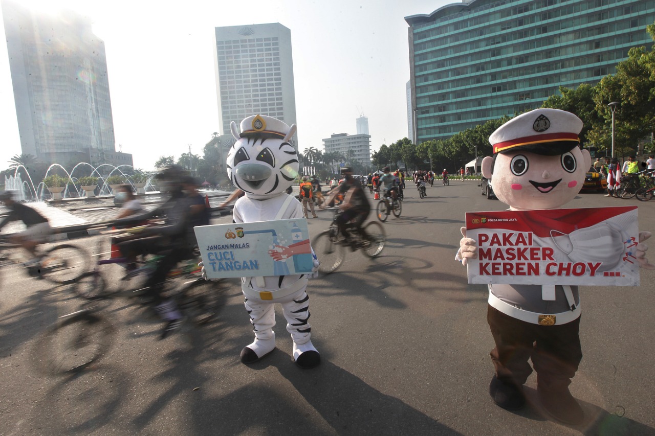 Sosialisasi Pengunaan Masker dan Cuci Tangan