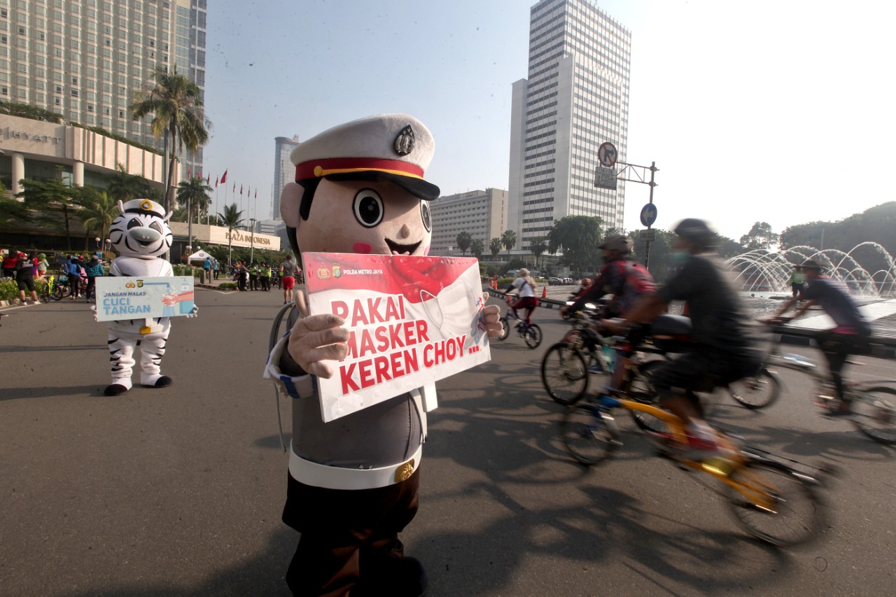 Sosialisasi Pengunaan Masker dan Cuci Tangan