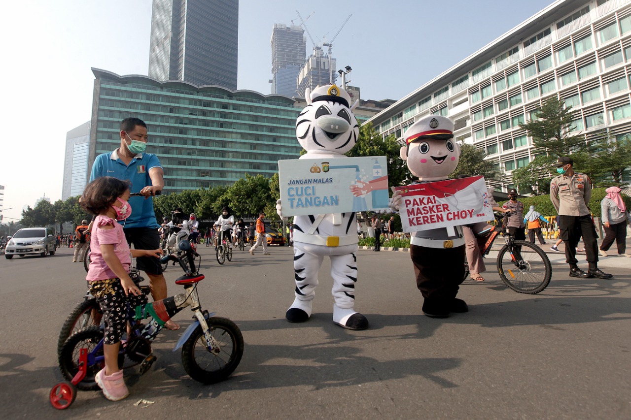 Sosialisasi Pengunaan Masker dan Cuci Tangan