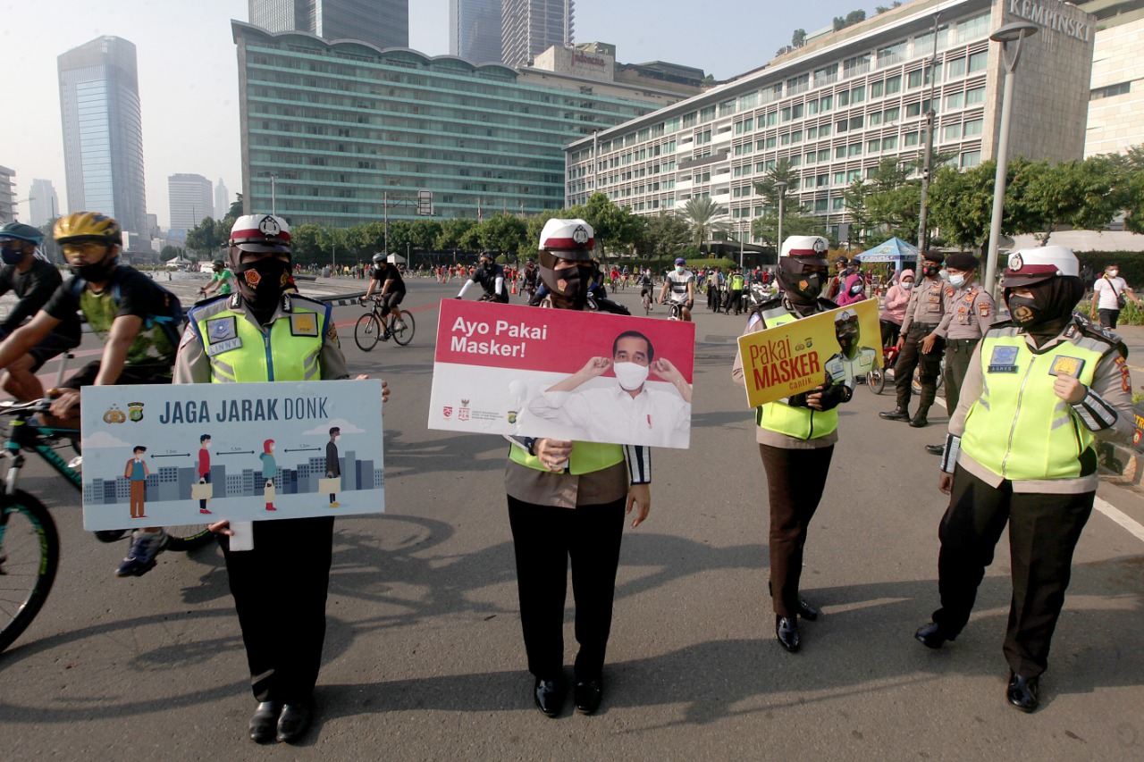 Sosialisasi Pengunaan Masker dan Cuci Tangan