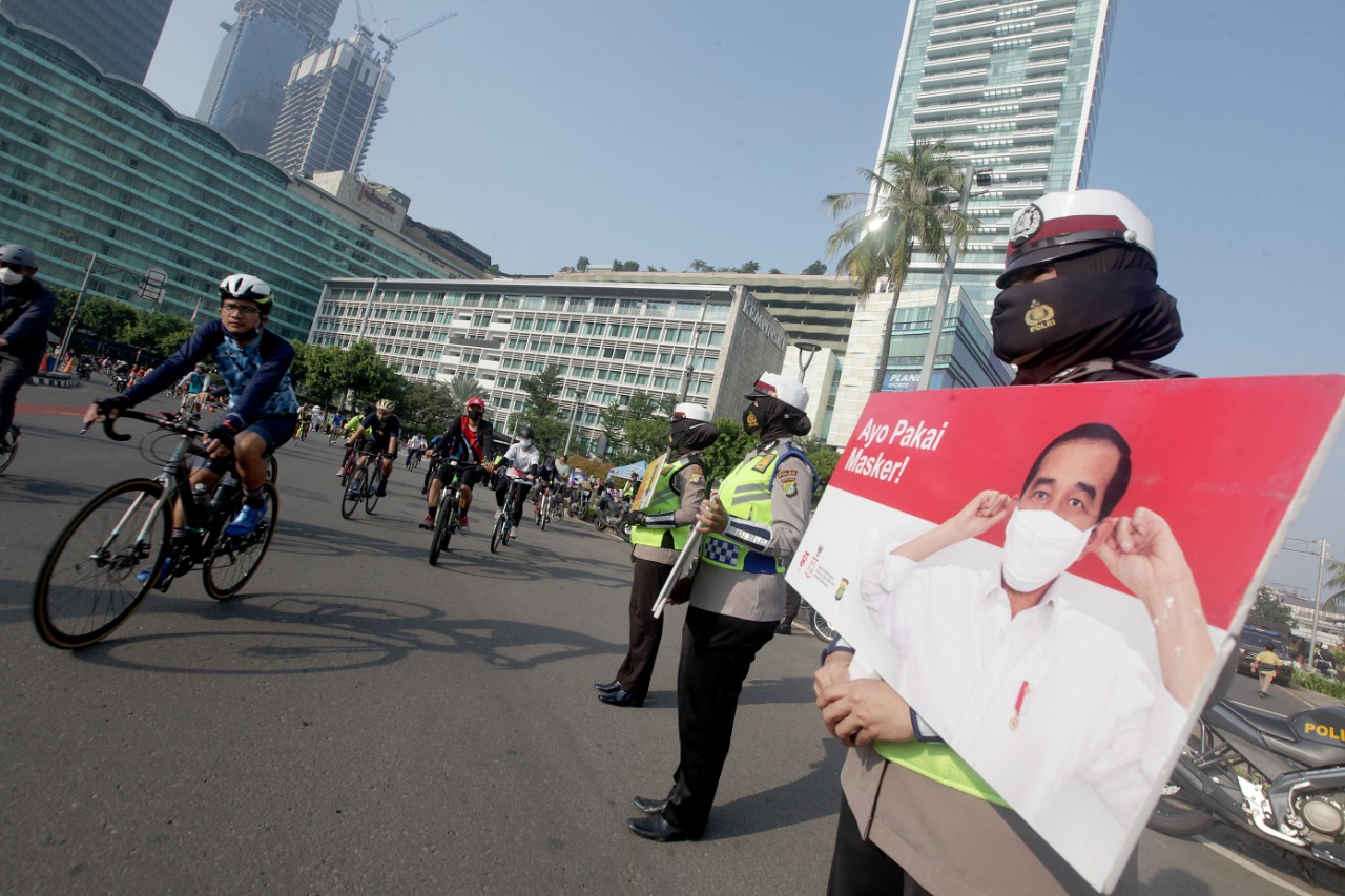 Sosialisasi Pengunaan Masker dan Cuci Tangan