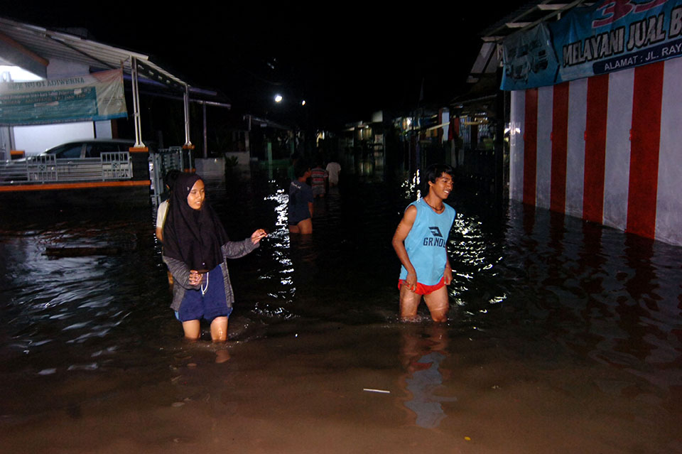 Banjir Luapan Sungai Banjaran di Tegal