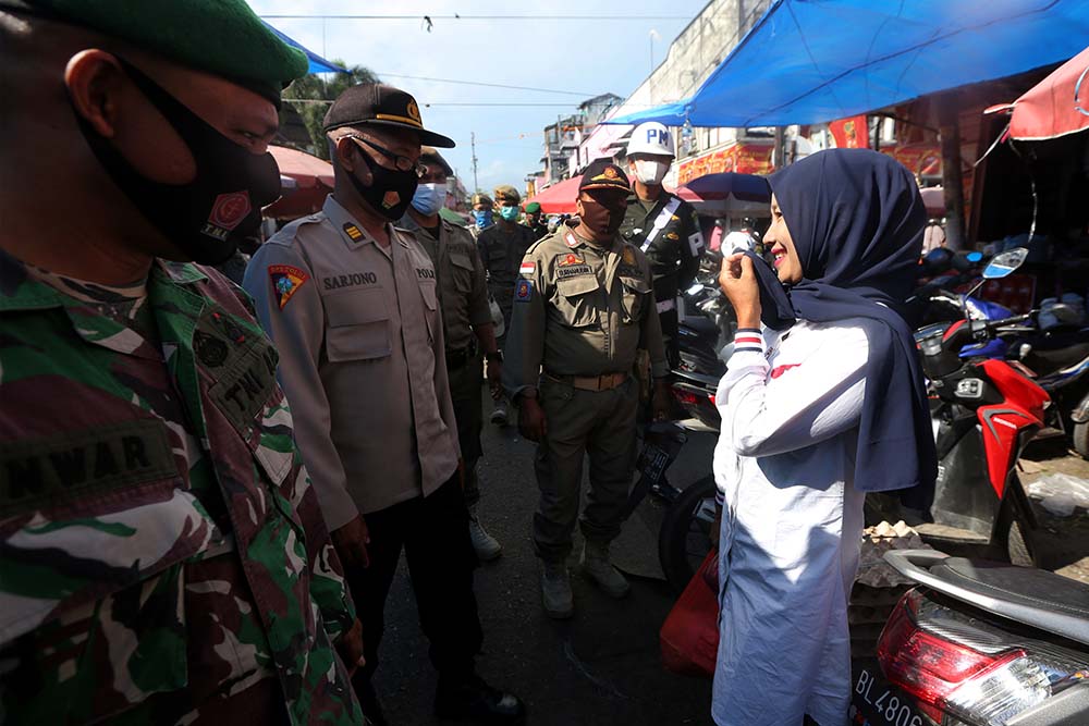 Razia Prokes di Pasar Tradisional